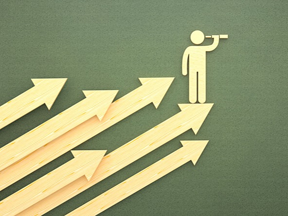 person on arrows looking through binoculars